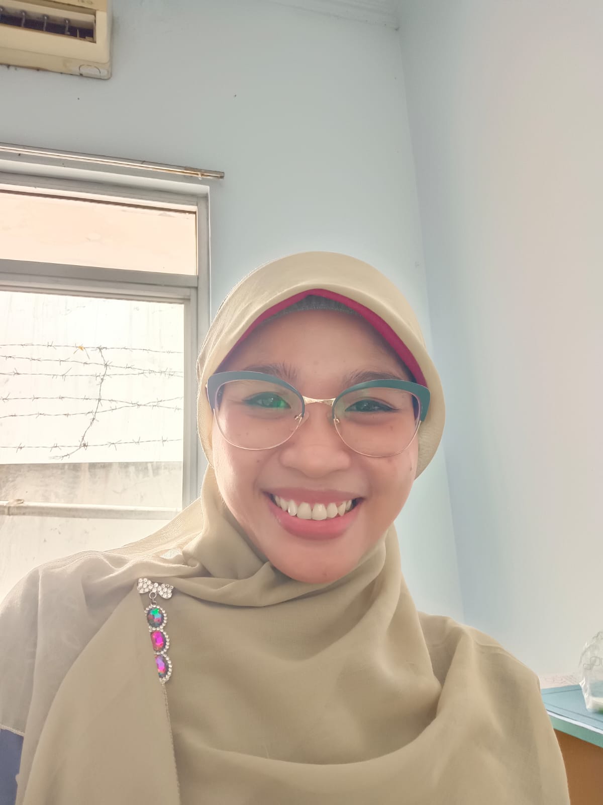 dr. Amelia Rizki Al Farozy